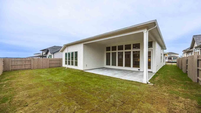 8512 Picnic House Path, Austin, TX 78744 - rear view of property with a patio area