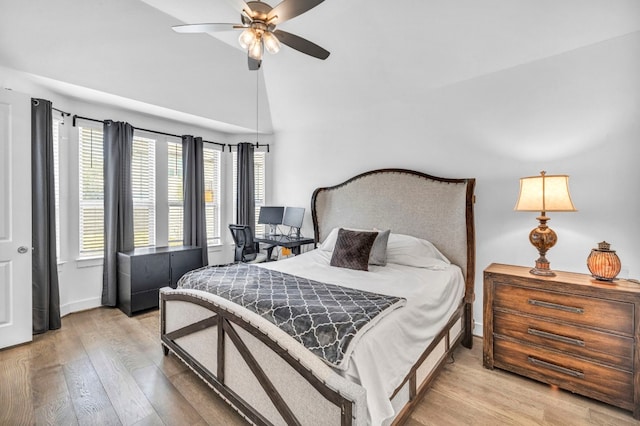 bedroom with light wood-type flooring and ceiling fan