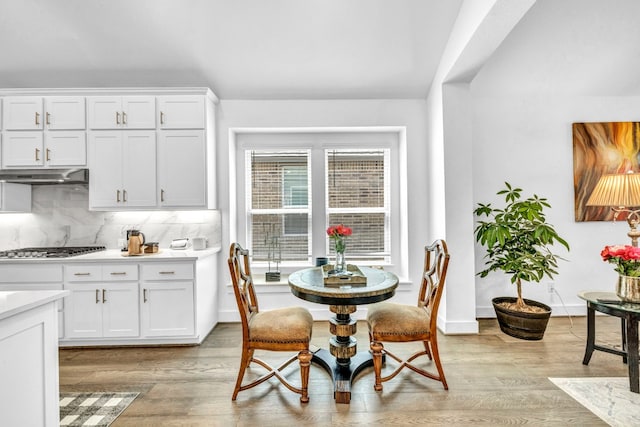 dining room with light hardwood / wood-style flooring