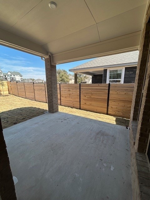 view of patio with fence