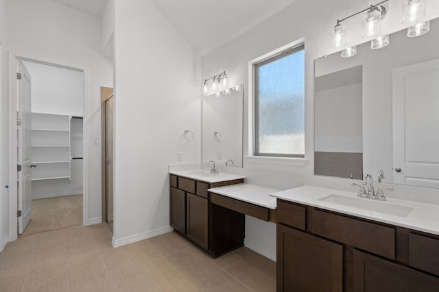 520 Raleigh Dr, Georgetown, TX 78633 - full bath featuring vanity, a shower with door, vaulted ceiling, and tile patterned flooring