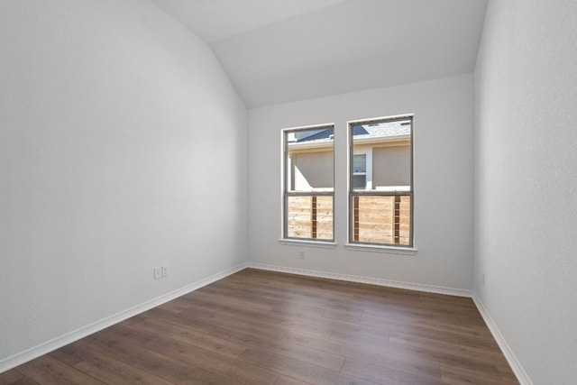520 Raleigh Dr, Georgetown, TX 78633 - spare room featuring dark wood-type flooring and lofted ceiling