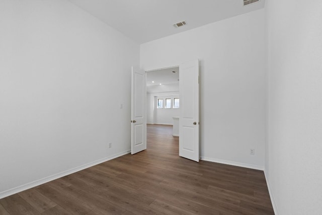 520 Raleigh Dr, Georgetown, TX 78633 - spare room featuring dark wood finished floors and baseboards