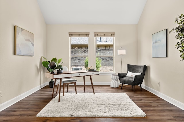 office area featuring dark hardwood / wood-style floors and vaulted ceiling