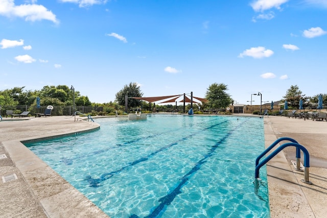 view of swimming pool featuring a patio