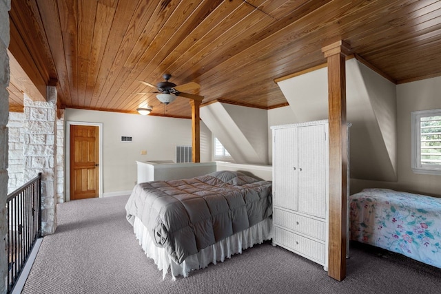 carpeted bedroom with ceiling fan, wood ceiling, crown molding, and vaulted ceiling