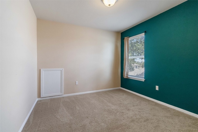 view of carpeted spare room