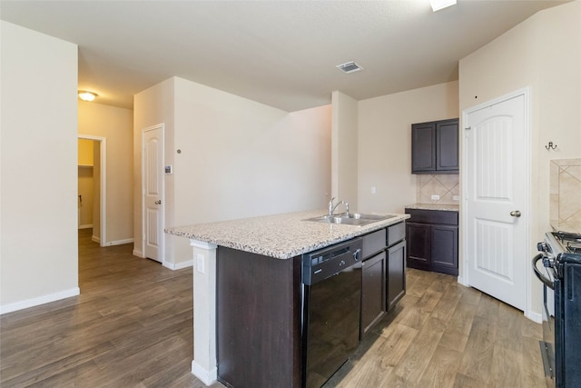 kitchen with black dishwasher, wood-type flooring, sink, backsplash, and gas range oven