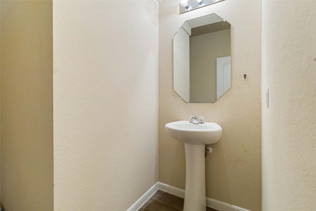 bathroom featuring hardwood / wood-style floors