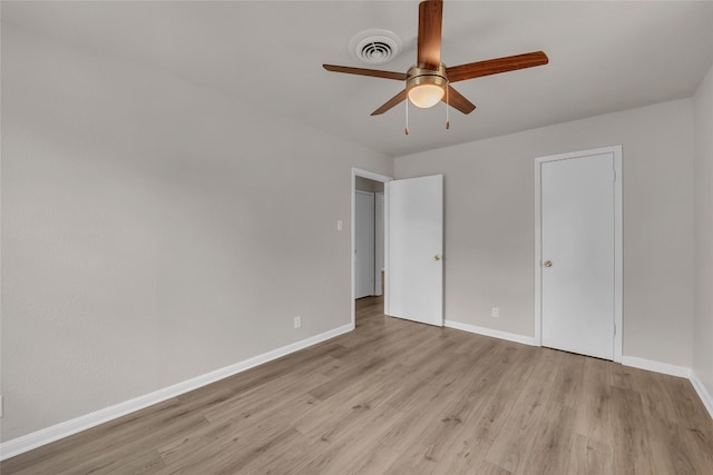 unfurnished bedroom featuring ceiling fan and light hardwood / wood-style floors