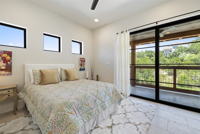 tiled bedroom featuring ceiling fan, access to outside, and multiple windows