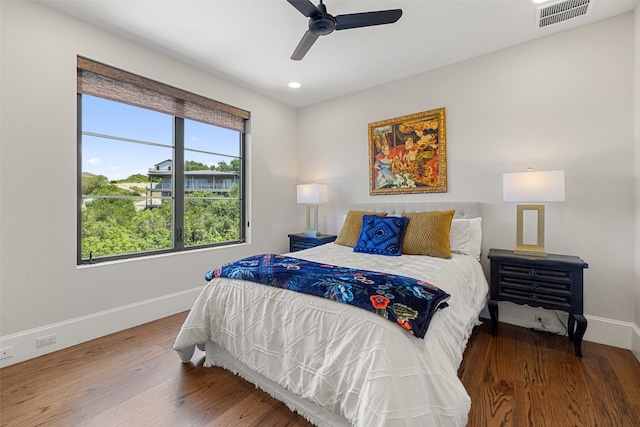 bedroom featuring hardwood / wood-style floors and ceiling fan