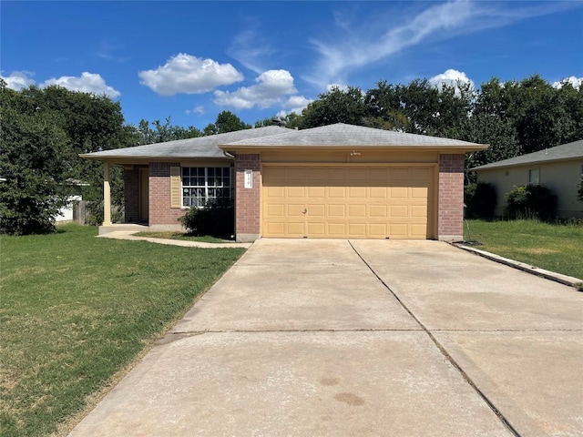 ranch-style house featuring a garage and a front lawn