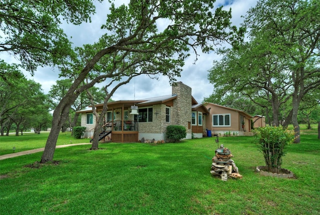 view of front of property with a front lawn and a porch