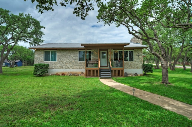 view of front of home with a front lawn