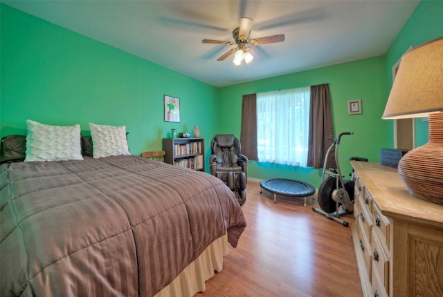 bedroom featuring ceiling fan and light wood-type flooring