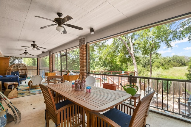 exterior space with ceiling fan