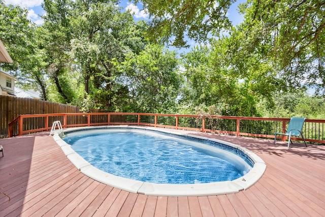 view of pool with a deck