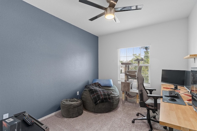 carpeted office space featuring lofted ceiling