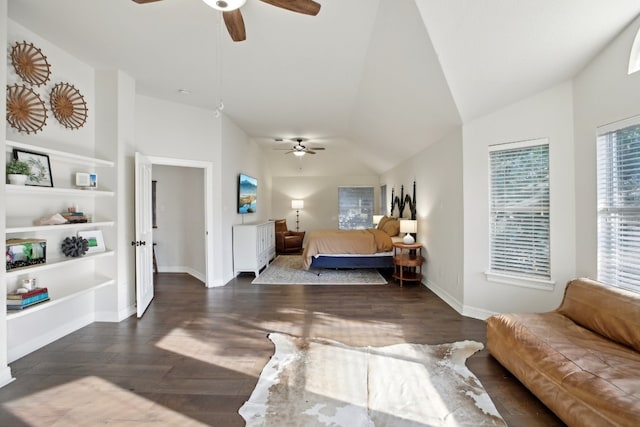 bedroom with ceiling fan, dark hardwood / wood-style flooring, and lofted ceiling