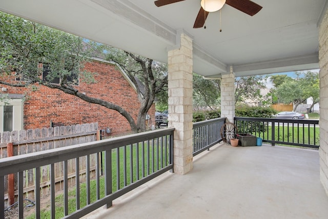 balcony with ceiling fan and covered porch