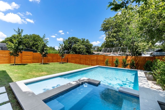 view of pool featuring a yard