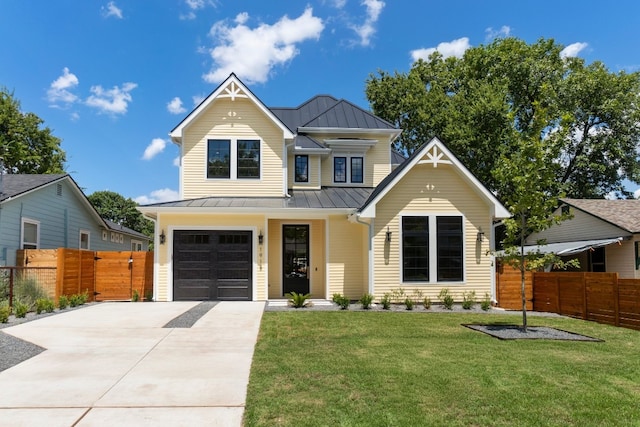 view of front facade with a front lawn and a garage