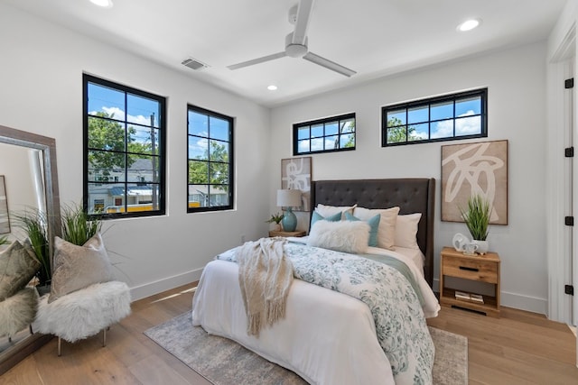 bedroom featuring ceiling fan and light wood-type flooring