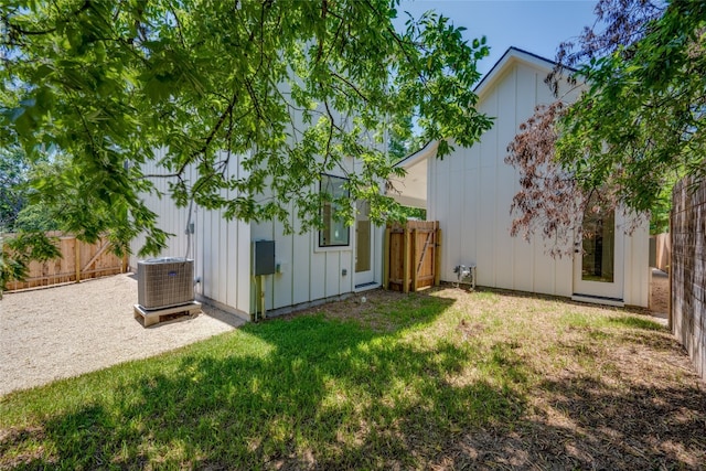 view of yard with central AC