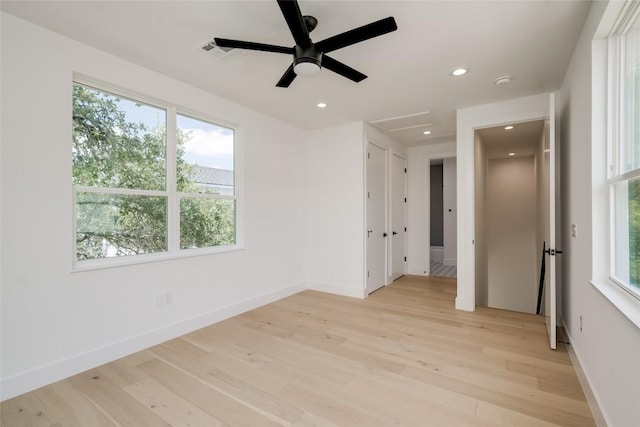 1928 Miles Ave Unit 2, Austin, TX 78745 - unfurnished room with light wood finished floors, a ceiling fan, recessed lighting, baseboards, and a smoke detector