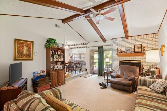 living area with carpet floors, vaulted ceiling with beams, visible vents, ceiling fan, and a textured ceiling