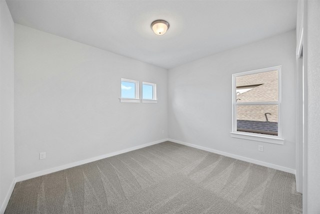 view of carpeted spare room