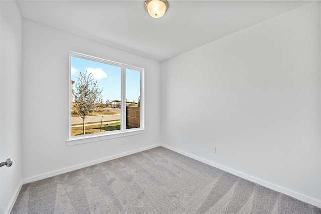 spare room with carpet flooring