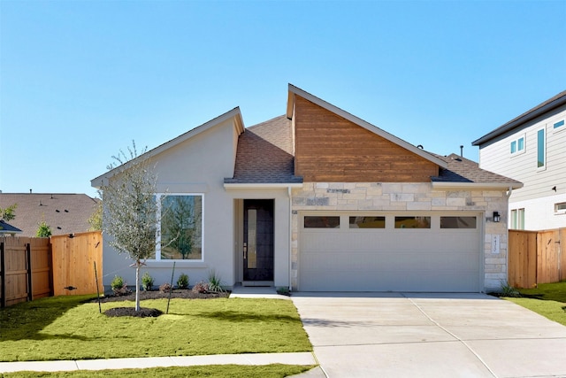 view of front facade featuring a garage and a front yard