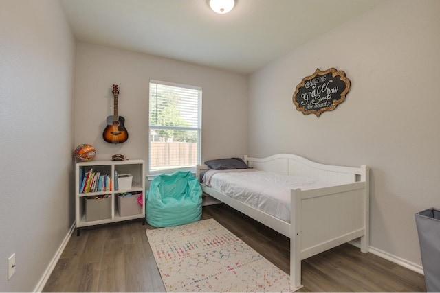 bedroom featuring dark hardwood / wood-style floors