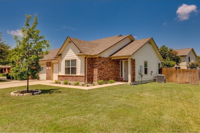 view of front of property with central AC unit and a front lawn