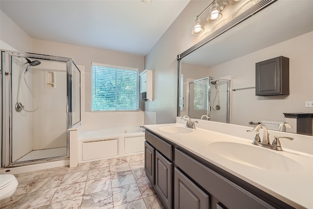 full bathroom with tile patterned flooring, separate shower and tub, dual vanity, and toilet