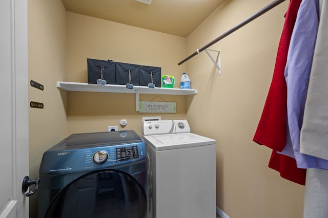 laundry area with washer and clothes dryer