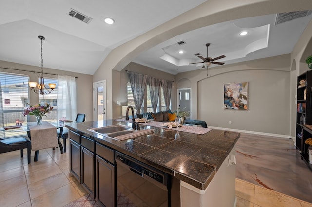 kitchen with sink, hanging light fixtures, dishwasher, and a wealth of natural light