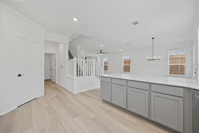 7005 Taruca Ln, Austin, TX 78736 - kitchen with gray cabinetry, plenty of natural light, crown molding, recessed lighting, and a chandelier
