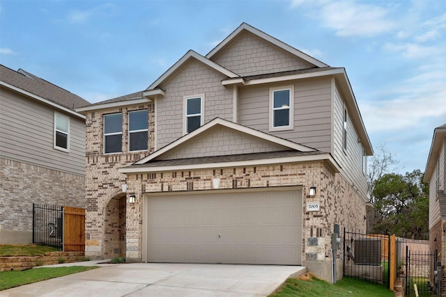 7005 Taruca Ln, Austin, TX 78736 - craftsman inspired home with concrete driveway, a gate, and brick siding