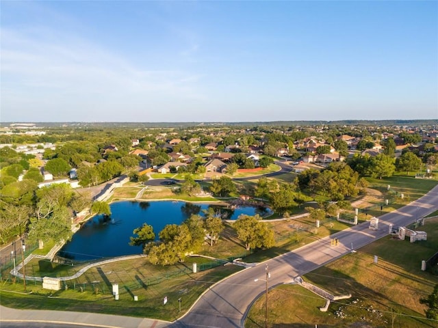 aerial view with a water view and a residential view