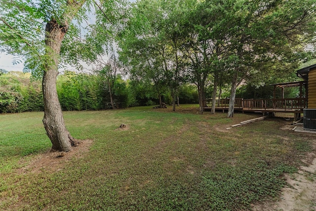 view of yard featuring a wooden deck