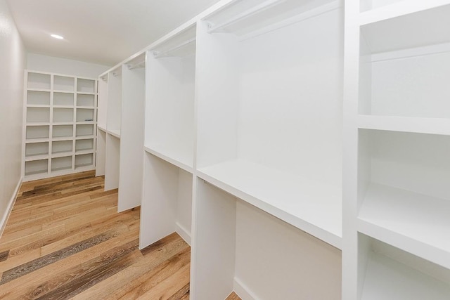 188 W Kaanapali Ln, Bastrop, TX 78602 - walk in closet with wood finished floors