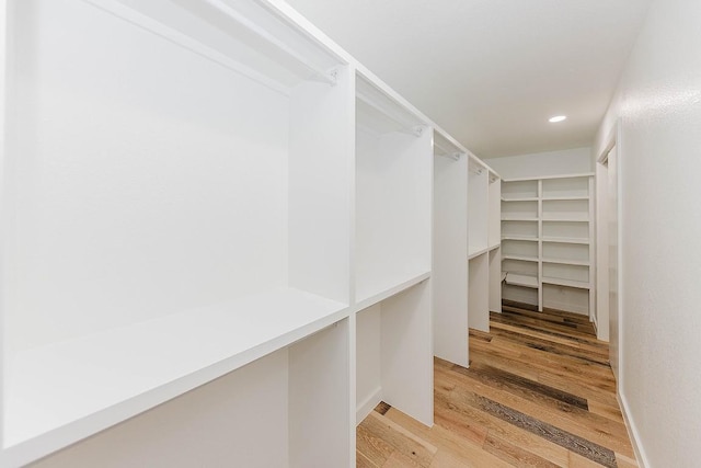 188 W Kaanapali Ln, Bastrop, TX 78602 - spacious closet with light wood finished floors