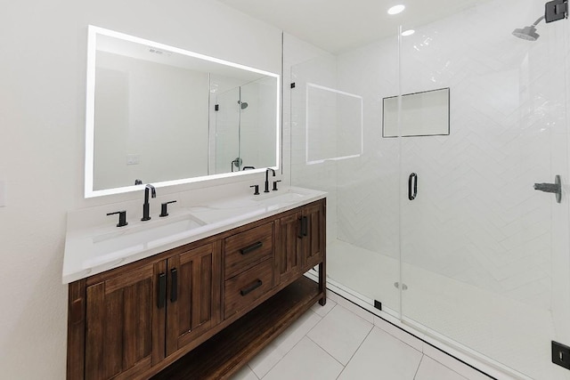 188 W Kaanapali Ln, Bastrop, TX 78602 - full bath featuring a shower stall, double vanity, and tile patterned floors