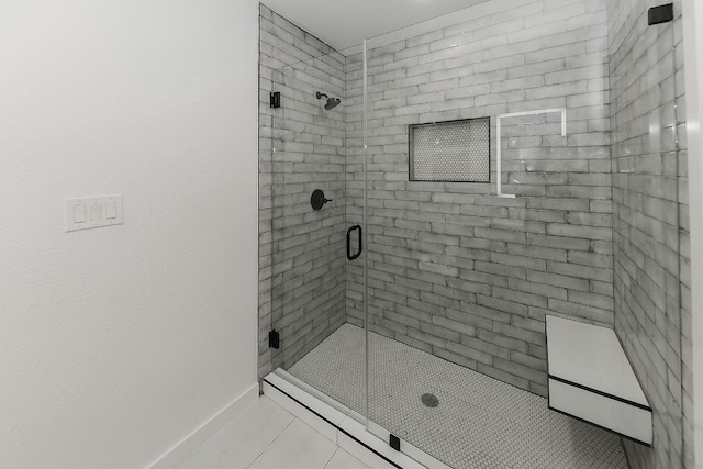 bathroom featuring an enclosed shower