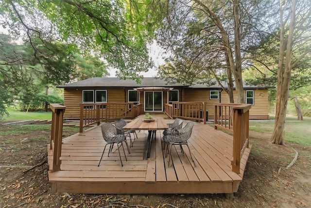 188 W Kaanapali Ln, Bastrop, TX 78602 - wooden terrace featuring outdoor dining area
