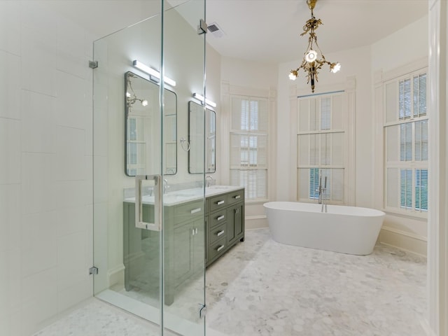 bathroom with separate shower and tub, a notable chandelier, tile patterned flooring, and vanity