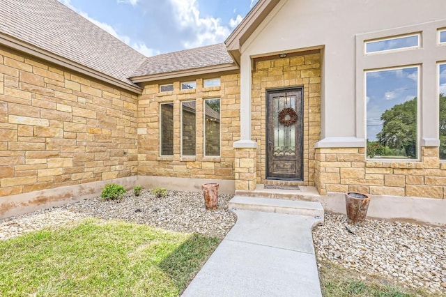 100 Gabgrove Ct, Georgetown, TX 78633 - entrance to property with stone siding and a shingled roof